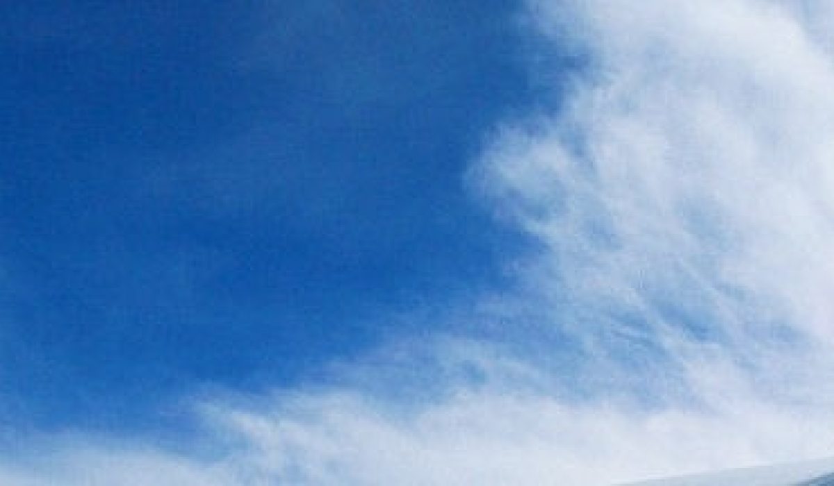 Snowboarder Leaning into Curve --- Image by © Royalty-Free/Corbis